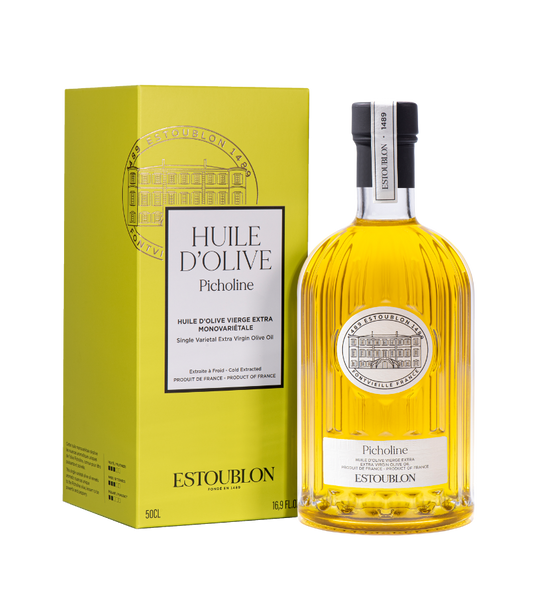 Bottle of Huile d'Olive Picholine with yellow packaging on a white background