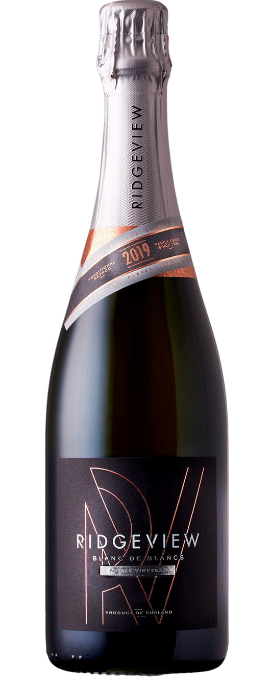 A bottle of Ridgeview Blanc de Blancs 2019 sparkling wine with a label that includes the brand name and vintage.